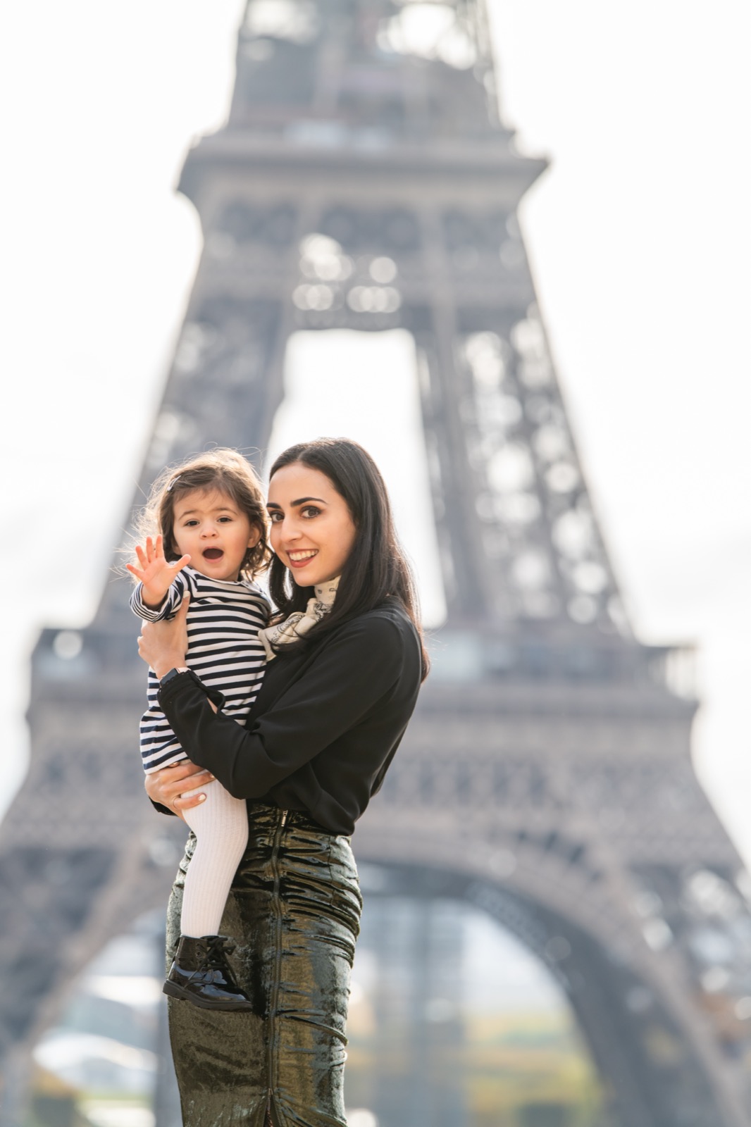 Carey and daughter at the Eiffel Tower